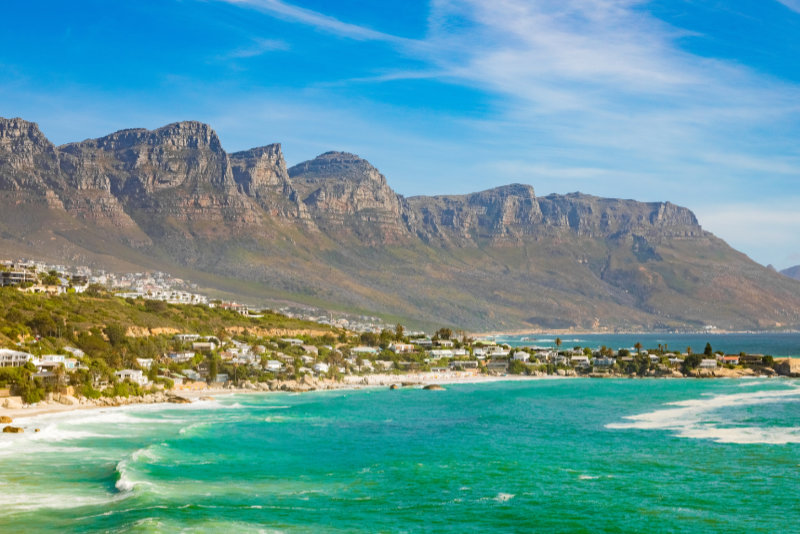 The breathtaking view of the rocky cliffs by the ocean captured in Cape Town, South Africa
